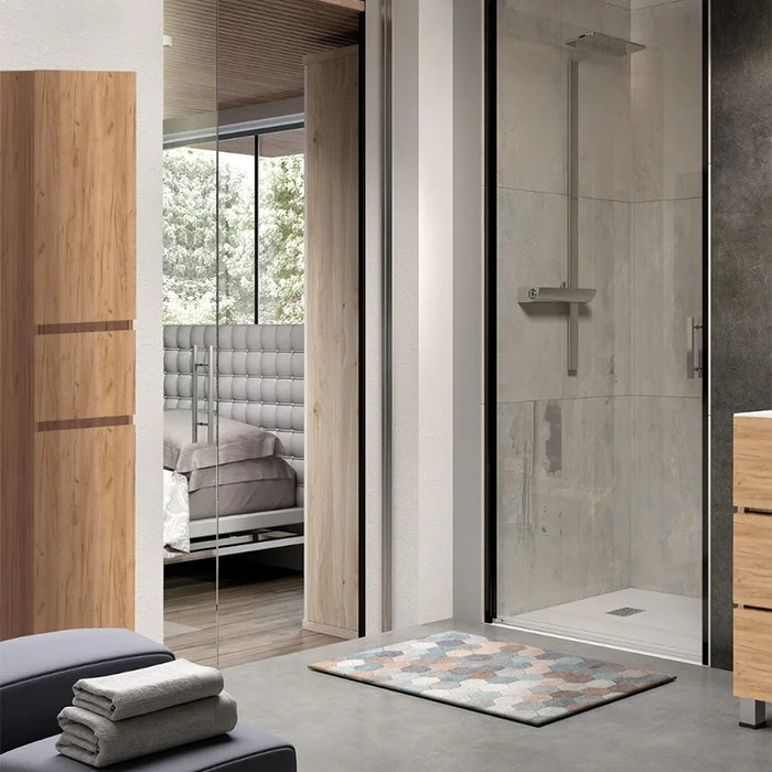 Moderno interior de baño con armario Boreal, ducha elegante y tapete decorativo, diseño minimalista y funcional.