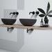 Modern bathroom with Atlaris shelves, featuring two bowls and stylish decor, highlighting elegant design and functionality.