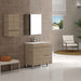 Armario de baño de colgar Modelo Basic en diseño moderno y funcional, instalado en un baño elegante.