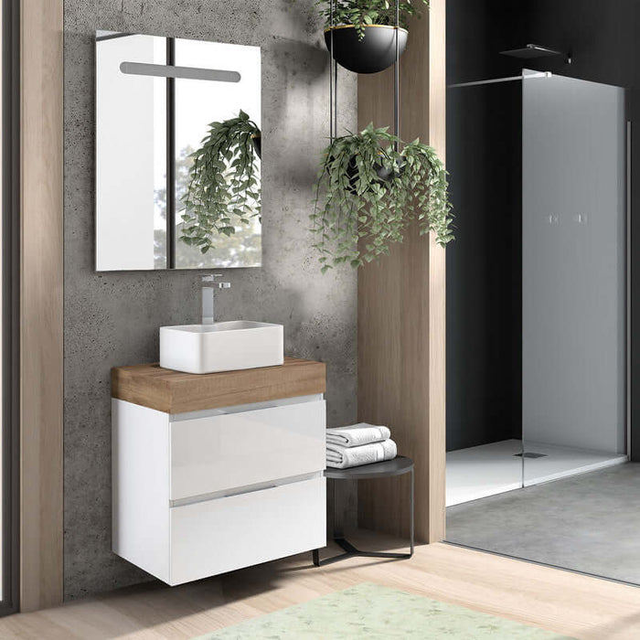 Baldas y tapa para lavabo Modelo Noa en un moderno baño con lavamanos blanco y espejo.